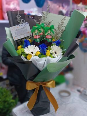 Borrachette con rosas azules y Gerberas