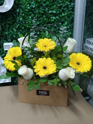 Cartera de rosas y Gerbera