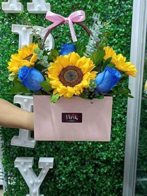 Cartera rosa azul y girasoles
